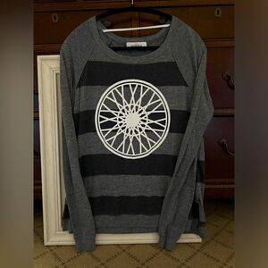 Soul Cycle long sleeve gray striped T-shirt with white design on front.  S